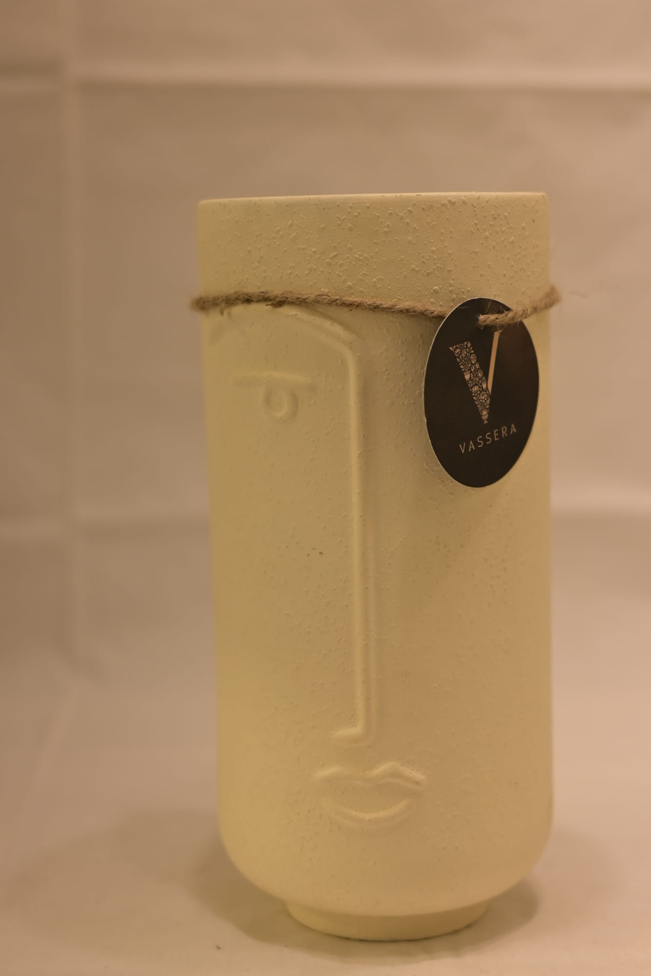 Serene Face Textured Ceramic Vase