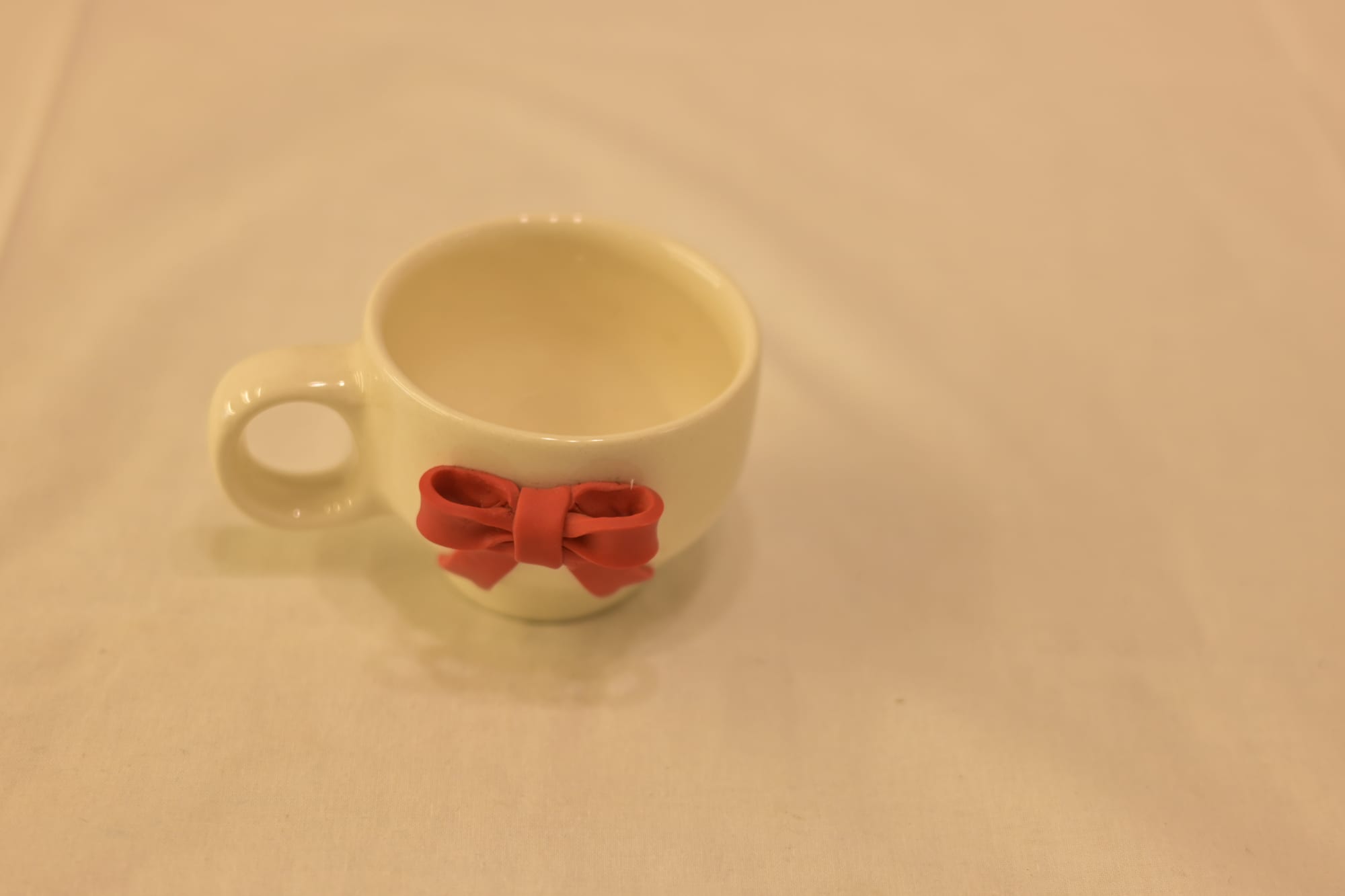 Scarlet Bow Ceramic Mug